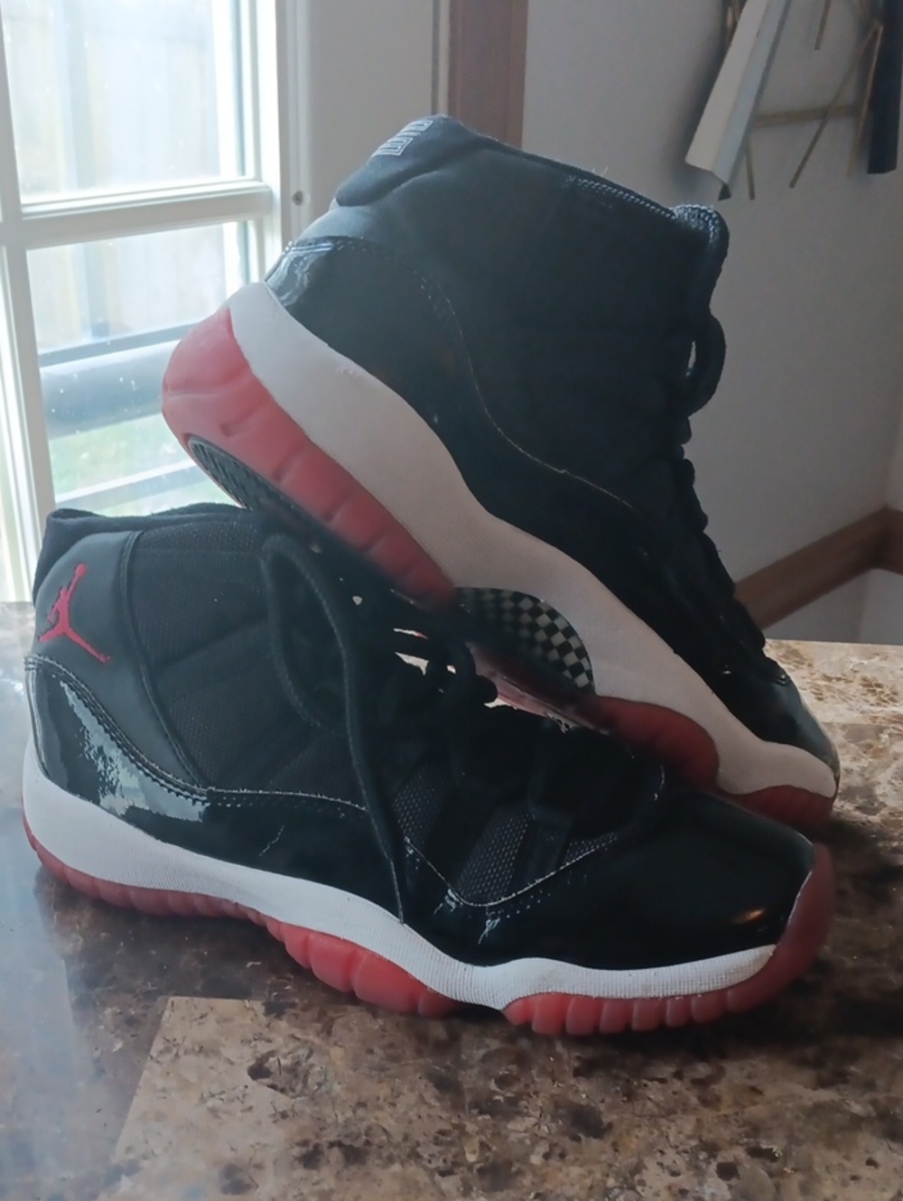 Jordan  Black and Red High-Top Sneakers